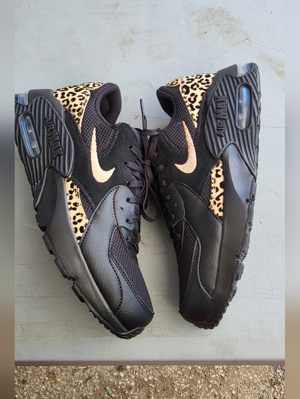 Nike Women’s Black Sneakers with Leopard and Gold Swoosh